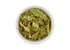Photo of a small bowl filled with loose lime flowers from SONNENTOR