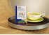 A photo of a pack All Good Again, Try Tea. The package is together with a tea cup on a serving tray.